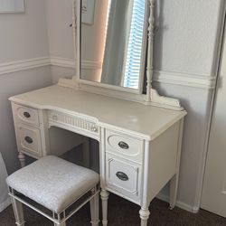 Vanity with swivel mirror