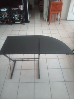 2 black tables and fitness reality bike