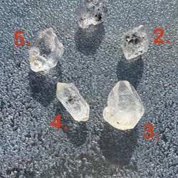 Angel Quartz with Tourmaline inside.