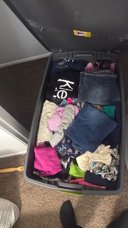 45 gal bin full of clothes