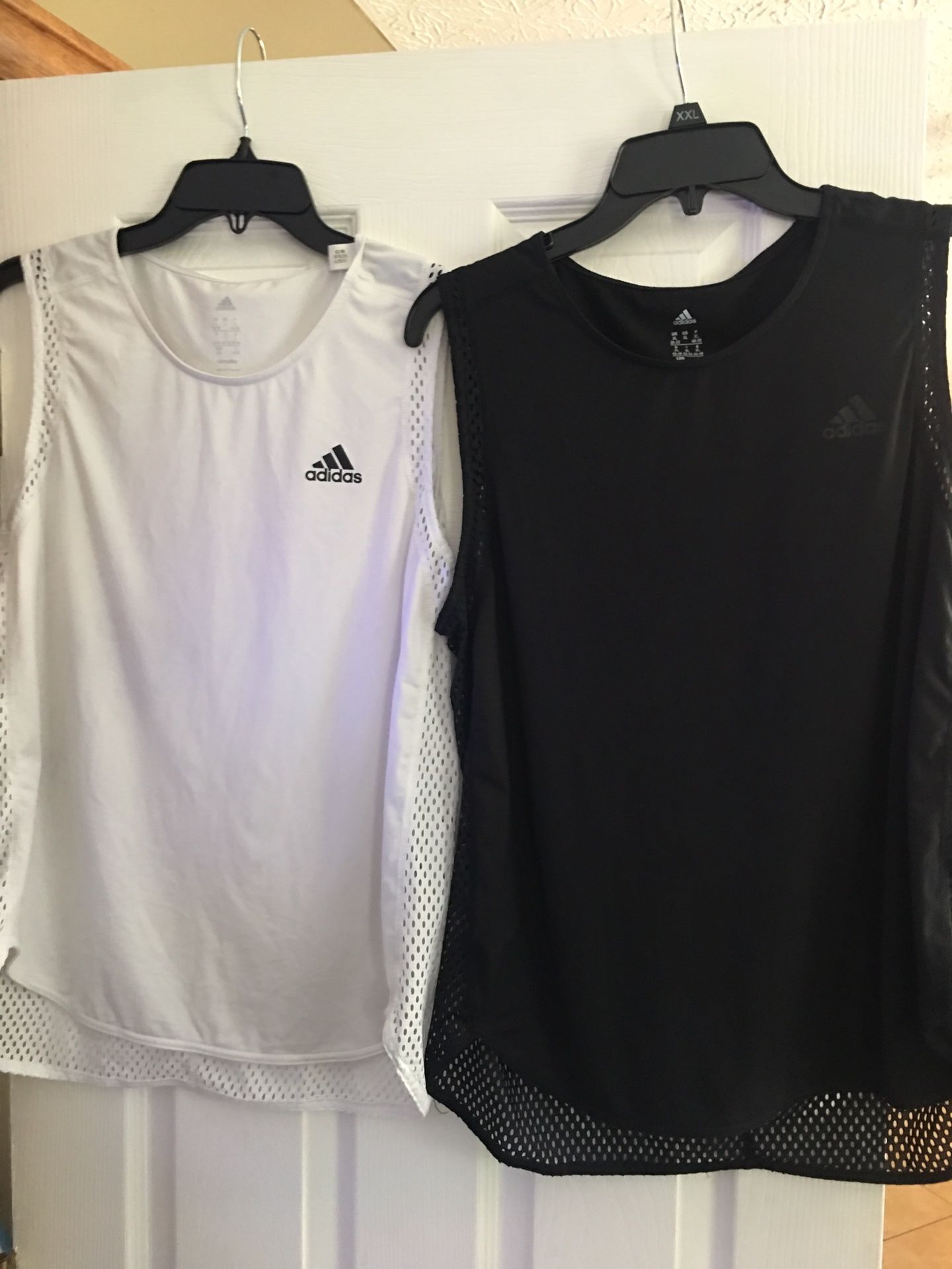 ADIDAS 2 Tank Tops. Black XL, White L. Excellent Condition. Worn Once. Mesh Sides. Pick up Dublin.