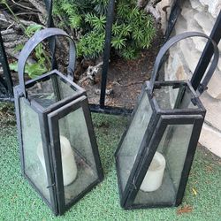 Two lanterns, unsure if the candles inside work 