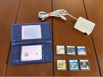 Nintendo DSI with Charger and Games