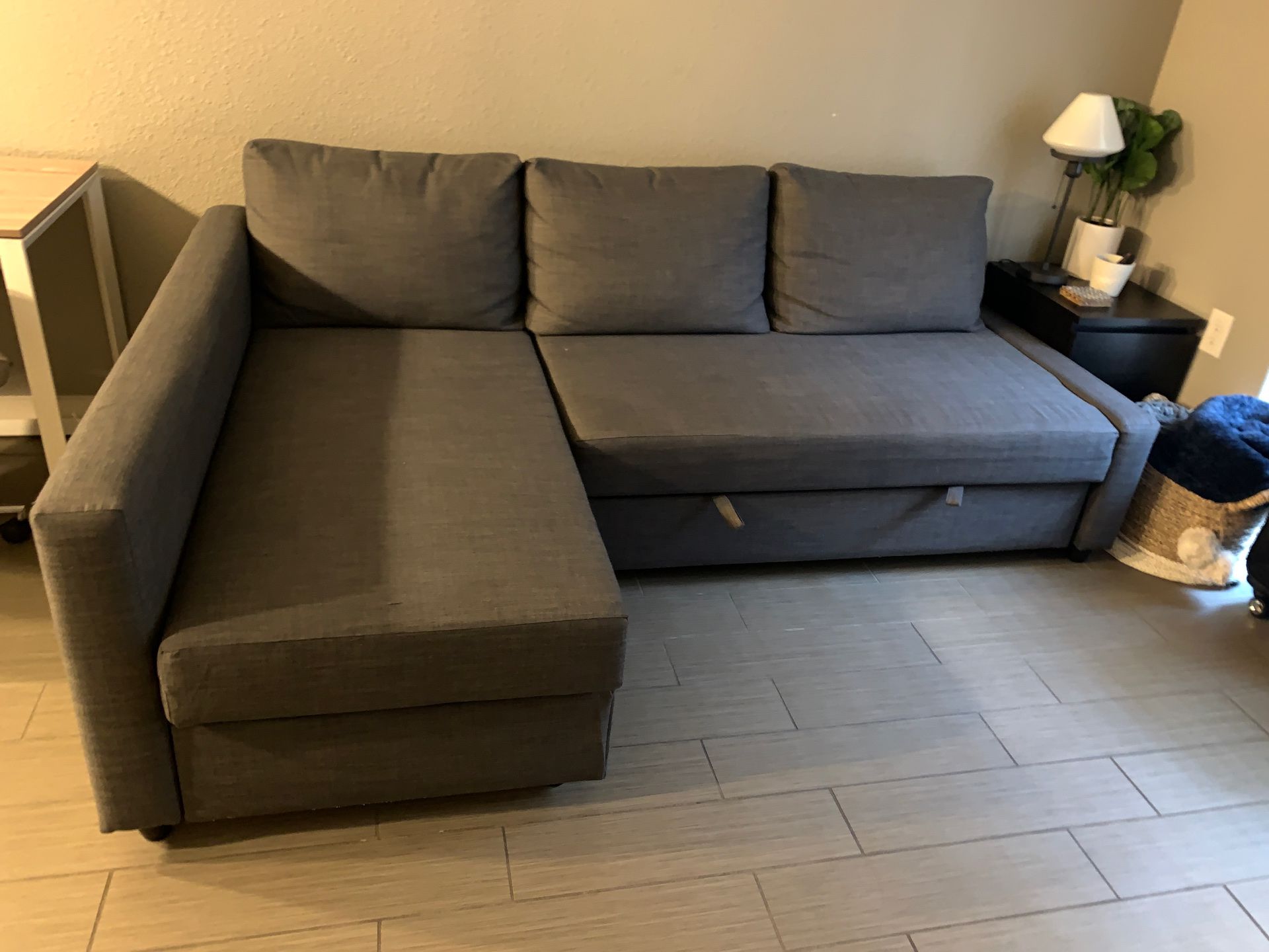 Sofa turns into queen size bed with storage