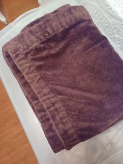 Four blanket throws new. $10. Ea. or oboSee description