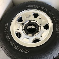Ford F-250 rims and tires with center caps!