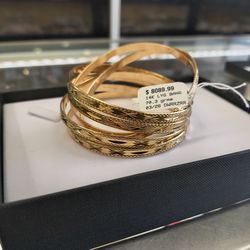 14k solid gold bagle 7 days bracelet 70.3 grams layaway available 10% dwon if you interested please make sure you ask for Maribel thank you