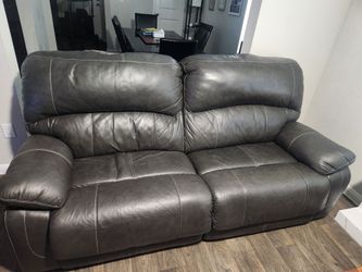 Electric, leather dual reclining sofa