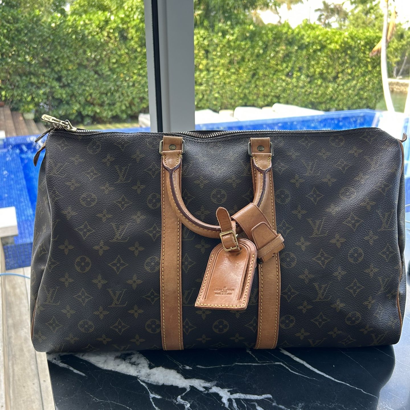 Louis Vuitton Small Duffle Bag for Sale in Ind Crk Vlg, FL - OfferUp