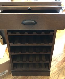 Quentin Brown Bar Cabinet-Brown . Valued at $245.00