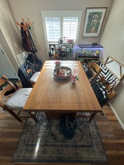 Dining table with wine bottle storage