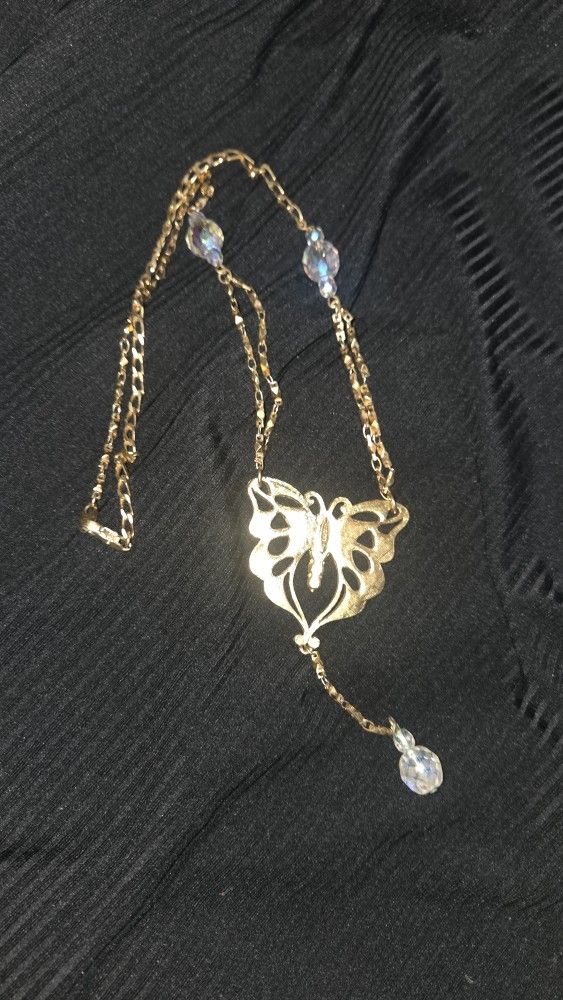 Gorgeous vintage signed AVON butterfly festoon necklace.