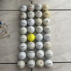 32 golf balls + Tees