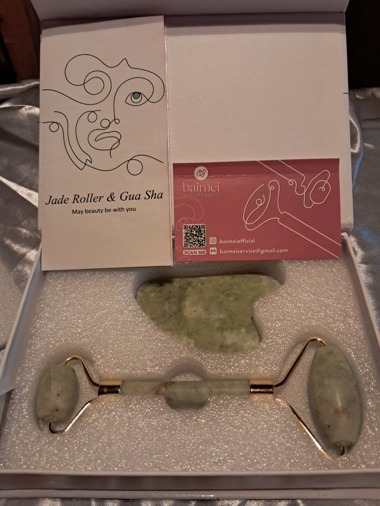 New Baimei skincare set. Has jade roller and gua sha stone.