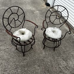 Heavy iron, rustic antique chairs