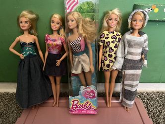 5 Barbie Dolls
