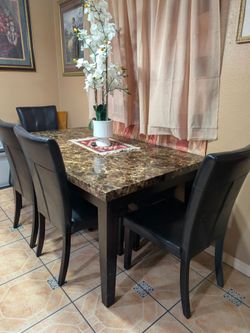 Dining room table and chairs set