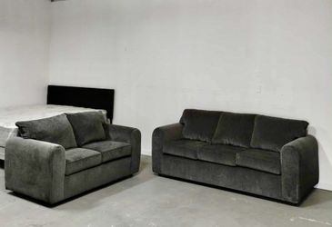 Brand New Couch & Loveseat Set   Modern and comfortable design — perfect for your living room! ✅ Brand new condition ✅ Soft gray upholstery ✅ Includes