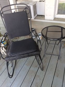 Iron rocking chair and small table