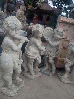 27 inch tall heavy concrete singing group
