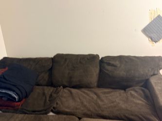 Brown soft sectional couch