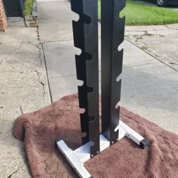 NORTHERN LIGHTS  VERTICAL DUMBBELL RACK  HOLDS 6 SETS 
7111.S WESTERN WALGREENS 
$75.   CASH ONLY AS IS 