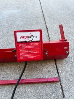 Pitching machine feeder