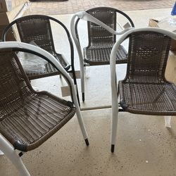 Brand New 4 Outdoor Patio Rattan Cafe Chairs .. Heavy Duty Used In Restaurants And then Are Stackable 