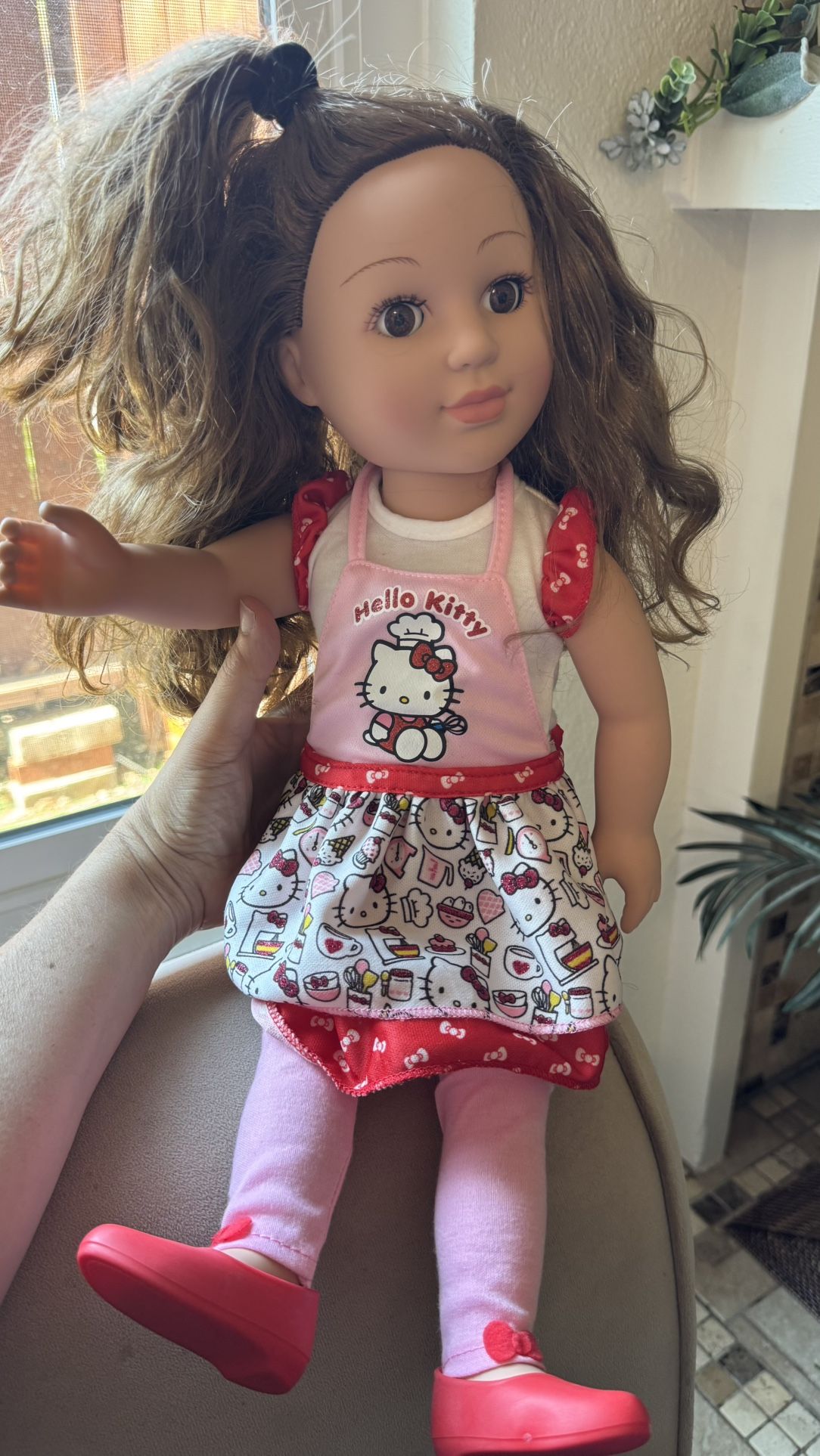 "My Life As" doll dressed in a "Hello Kitty" themed outfit.