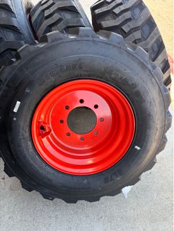 4 Bobcat tires with rim 12x16.5 $1600