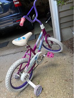 Girls bike with training wheels