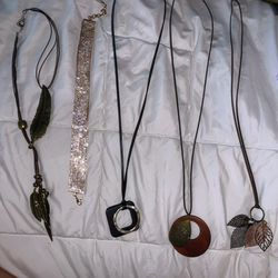 Necklaces Made With Leather Wood And Metal