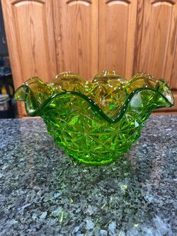 Vintage 1960’s  Tiffin Glass Williamsburg Empire Green Ruffled Fruit Bowl.  Size approximately 10 1/2 inches wide and 5 3/4 inches tall.  Preowned.  B