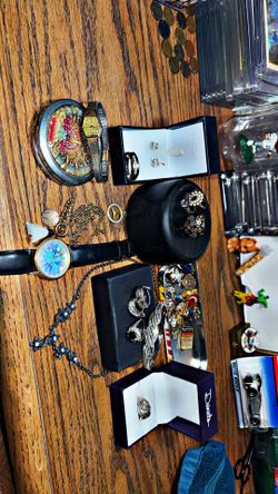 Jewelry and miscellaneous trinkets and a vintage silver mirror thing