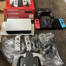 Nintendo Switch Oled with Extra Controllers 