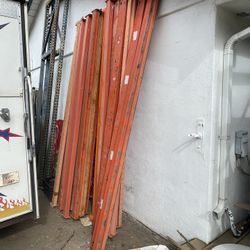 Approximately 110” Orange Beams And Wire Shelves