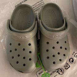 Crocs. Size W6