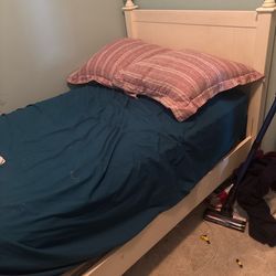 Twin mattress and frame and box spring.