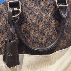 Alma BB · Damier Ebene coated canvas 