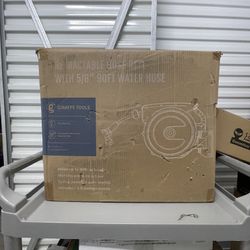 Giraffe retractable hose Reel, Brand New, Priced to sell