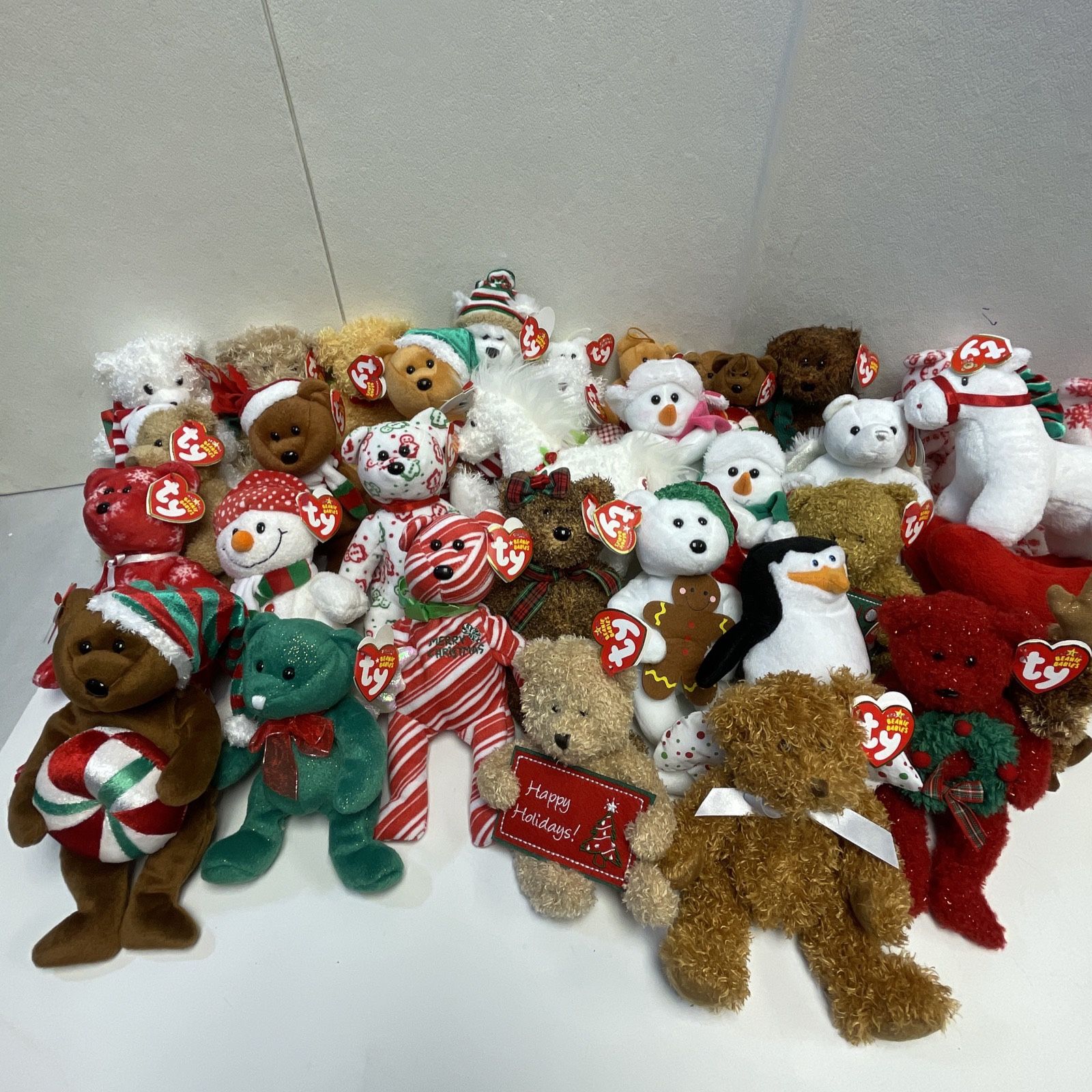 Lot of 34 TY Christmas / Holiday Beanie Babies - Santa Snowman Bear Angel Tags