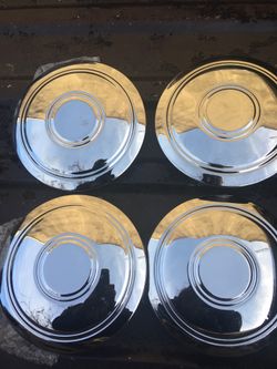 A set of brand new moon cap for Chevy pick up truck with Rallying rims $50.00