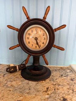 Vintage electric ship's wheel clock