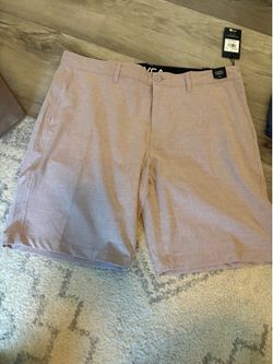 Brand new w/tags mens 38  length 20” mauve shorts.