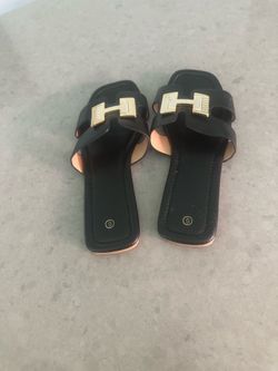Black with green gold H very nice?