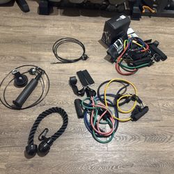 One Pulley System, One Fitness Insanity Bands New And One S. Bands Used.