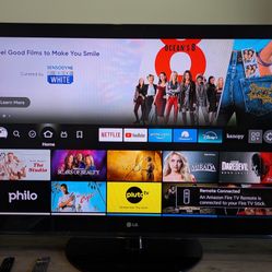 55" LG TV + Amazon Firestick + Speakers