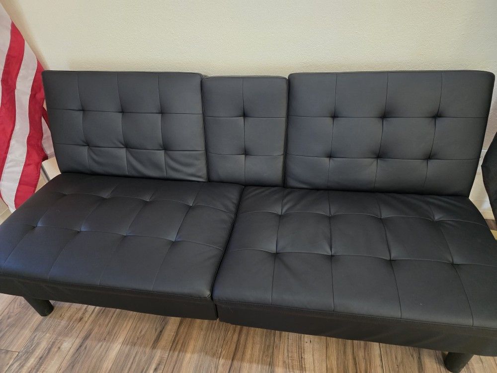 Black Armchairs and Sleeing Sofa