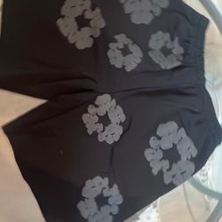BLACK DENIM TEARS SHORTS