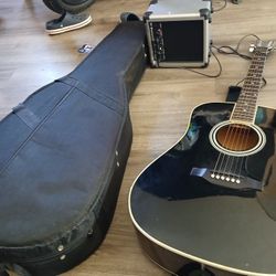 GUITARRA CON  BOSINA  BUENAS  CONDITION 
